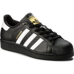 Buty adidas - Superstar B23642 CBlack/FtWht/CBlack. Czarne buty sportowe damskie Adidas, w paski, z gumy, sportowe, adidas superstar. W wyprzedaży za 259,00 zł.