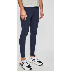Tommy Sport - Legginsy sportowe. Niebieskie spodnie męskie Tommy Sport, s, bez wzorów, z elastanu, sportowe. W wyprzedaży za 199,90 zł.
