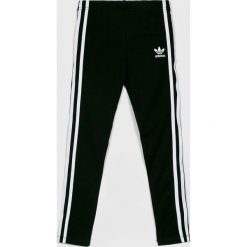 Adidas Originals - Legginsy dziecięce 128-70 cm. Czarne spodnie dziewczęce adidas Originals, bez wzorów, z elastanu. Za 129,90 zł.