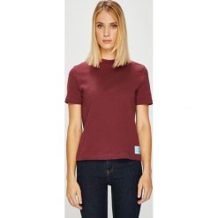 Calvin Klein Jeans - Top. Brązowe bluzki z odkrytymi ramionami marki Calvin Klein Jeans, s, z bawełny, z okrągłym kołnierzem. W wyprzedaży za 119,90 zł.