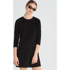Sukienka sportowa - Czarny. Czarne sukienki damskie Sinsay, s, bez wzorów, sportowe, bez kołnierzyka, bez rękawów, sportowe. Za 49,99 zł.