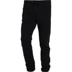 Spodnie dresowe męskie: Superdry URBAN FLASH Spodnie treningowe black