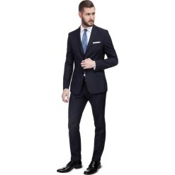 Garnitur LEONARDO GXGS900033. Pomarańczowe garnitury męskie Giacomo Conti, bez wzorów, z elastanu. Za 599,00 zł.