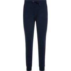 Spodnie dresowe EA7 Emporio Armani 6GTP59 TJ31Z 1554. Niebieskie spodnie damskie EA7 Emporio Armani, s, z elastanu. W wyprzedaży za 289,00 zł.