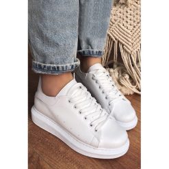 Buty sportowe damskie JOY. Białe buty sportowe damskie Buty sportowe damskie JOY, bez wzorów, sportowe. W wyprzedaży za 89,00 zł.