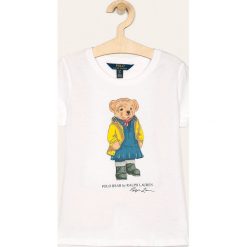 Polo Ralph Lauren - T-shirt dziecięcy 128-176 cm. Białe bluzki dziewczęce Polo Ralph Lauren, z nadrukiem, z bawełny, z okrągłym kołnierzem, z krótkim rękawem, krótkie, bez kaptura. Za 179,90 zł.