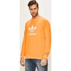 Adidas Originals - Bluza. Pomarańczowe bluzy męskie xl, z nadrukiem, z poliesteru, z okrągłym kołnierzem. W wyprzedaży za 179,90 zł.