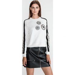 Just Cavalli Bluza Biały. Białe bluzy damskie Just Cavalli, l, z haftami, z bawełny, bez rękawów, bez kaptura. Za 1582,95 zł.
