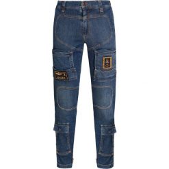 Spodnie AERONAUTICA MILITARE. Niebieskie spodnie męskie Aeronautica Militare, z aplikacjami, z jeansu, militarne. Za 1230,00 zł.