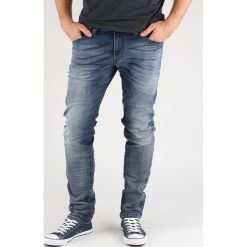 Diesel Thavar Dżinsy Niebieski. Niebieskie jeansy męskie Diesel, bez wzorów. Za 1024,95 zł.