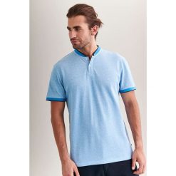 Koszulka polo w kolorze jasnoniebieskim. Niebieskie koszulki męskie TATUUM, m, bez wzorów, z bawełny, polo, bez rękawów. W wyprzedaży za 64,95 zł.