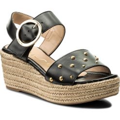 Espadryle UNISA - Kaba Ne Black. Czarne espadryle damskie Unisa, bez wzorów, ze skóry ekologicznej, bez obcasa, na obcasie. W wyprzedaży za 289,00 zł.