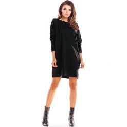 Sukienka oversize bawełniana czarna. Czarne sukienki damskie e-margeritka.pl, na co dzień, s, bez wzorów, z bawełny, casualowe, bez kołnierzyka, z krótkim rękawem, krótkie, mini, proste. Za 119,99 zł.