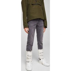 Mango Kids - Jeansy dziecięce Bleach 116-164 cm. Szare jeansy męskie marki Mango Kids, z elastanu. W wyprzedaży za 69,90 zł.