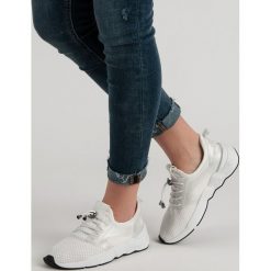 BUTY SPORTOWE ZE ŚCIĄGACZEM. Żółte buty sportowe damskie Merg, bez wzorów, bez zapięcia. Za 49,90 zł.
