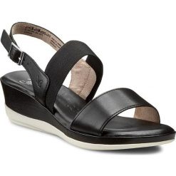 Sandały CAPRICE - 9-28705-26 Black 001. Czarne klapki damskie marki Caprice, w paski, ze skóry, bez obcasa, na koturnie. W wyprzedaży za 189,00 zł.