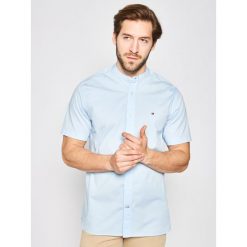 Koszula TOMMY HILFIGER Stretch Poplin Shirt MW0MW13456. Niebieskie koszule męskie TOMMY HILFIGER, xl, bez wzorów, z elastanu, casualowe, bez kołnierzyka, bez rękawów. W wyprzedaży za 219,00 zł.