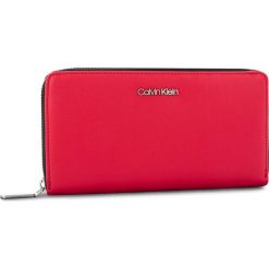 Duży Portfel Damski CALVIN KLEIN - Fold Large Zip Aroun K60K604491 627. Czerwone portfele damskie marki Calvin Klein, ze skóry ekologicznej. Za 299,00 zł.