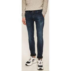 Guess Jeans - Jeansy Vicente. Niebieskie jeansy męskie Guess Jeans, s, z aplikacjami. W wyprzedaży za 269,90 zł.