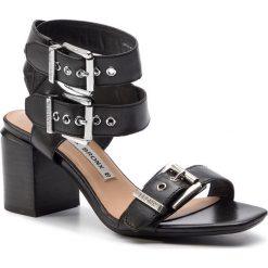 Sandały BRONX - 84759-B BX 1558 Black 01. Czarne klapki damskie Bronx, bez wzorów, ze skóry, bez obcasa, na obcasie. W wyprzedaży za 279,00 zł.