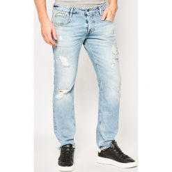 Jeansy Slim Fit Guess vermont M02AS3 D3ZJ1. Niebieskie jeansy męskie Guess, m, z aplikacjami, z jeansu. W wyprzedaży za 289,00 zł.
