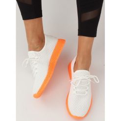 Buty sportowe biało-pomarańczowe NB283 FLUORESCENCE ORANGE. Pomarańczowe buty sportowe damskie obuwie damskie, z tkaniny. Za 66,56 zł.