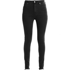 Tiger of Sweden Jeans SANDIE Jeans Skinny Fit black. Czarne jeansy damskie relaxed fit marki Tiger of Sweden Jeans, z bawełny. W wyprzedaży za 350,35 zł.