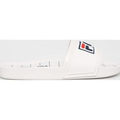 Melissa - Klapki x Fila. Białe klapki damskie Melissa, bez wzorów, z gumy, bez obcasa, na obcasie. W wyprzedaży za 229,90 zł.