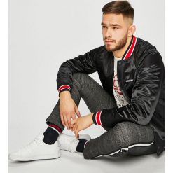 Calvin Klein Jeans - Kurtka bomber. Czarne płaszcze męskie Calvin Klein Jeans, m, bez wzorów, z elastanu, krótkie, bez kaptura. Za 769,90 zł.
