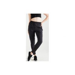Spodnie cardio fitness 100 damskie. Czarne spodnie damskie DOMYOS, xs, z elastanu. Za 69,99 zł.