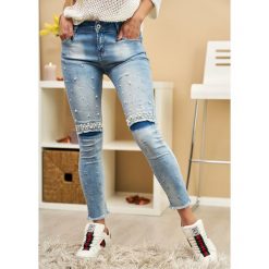 HOT PERŁY KOLANO SPODNIE JEANS SLIM FIT XS. Czarne spodnie damskie LIGARI, na co dzień, s, w paski, z bawełny, casualowe, bez kołnierzyka, bez rękawów. Za 109,00 zł.