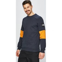 The North Face - Bluza. Niebieskie bluzy męskie The North Face, m, bez wzorów, z bawełny, z okrągłym kołnierzem, bez rękawów, bez kaptura. W wyprzedaży za 279,90 zł.
