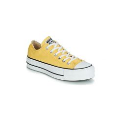 Buty Converse CHUCK TAYLOR ALL STAR LIFT SEASONAL COLOR OX. Żółte trampki i tenisówki damskie Converse, bez wzorów, bez zapięcia. Za 349,00 zł.
