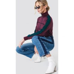 NA-KD Trend Jeansy z szerokimi nogawkami - Blue. Niebieskie jeansy damskie marki NA-KD Trend. W wyprzedaży za 101,47 zł.