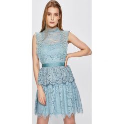 Answear - Sukienka. Zielone sukienki damskie ANSWEAR, s, bez wzorów, z bawełny, eleganckie, bez kołnierzyka, bez rękawów, mini, rozkloszowane. Za 259,90 zł.
