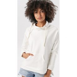 Kremowa Bluza Corigonia. Brązowe bluzy damskie Born2be, xl, bez wzorów, bez rękawów, bez kaptura. W wyprzedaży za 69,99 zł.