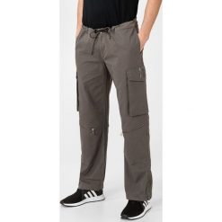Adidas Originals Spodnie Szary. Szare spodnie męskie adidas Originals, bez wzorów, z poliesteru. Za 412,95 zł.