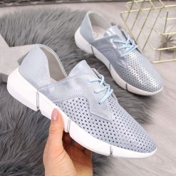 Buty sportowe damskie skórzane ażurowe niebieskie Jezzi - niebieski. Niebieskie buty sportowe damskie Jezzi, bez wzorów, sportowe. Za 139,99 zł.