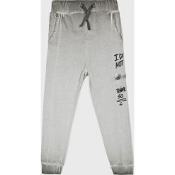 Blukids - Spodnie dziecięce 104-134 cm. Szare spodnie chłopięce Blukids, bez wzorów, z materiału, casualowe. W wyprzedaży za 59,90 zł.