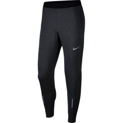 Spodnie do biegania męskie NIKE DRI-FIT PHENOM / 857838-011. Spodnie męskie Nike, m, bez wzorów. Za 259,99 zł.