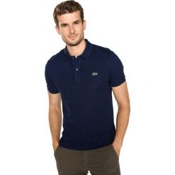 Lacoste Polo Koszulka Niebieski. Niebieskie podkoszulki męskie Lacoste, s, bez wzorów, z bawełny, bez rękawów. Za 395,95 zł.
