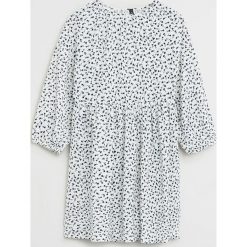 Mango Kids - Sukienka dziecięca Nadima 110-164 cm. Białe sukienki dziewczęce Mango Kids, bez wzorów, z elastanu, casualowe, z długim rękawem, długie, maxi, rozkloszowane. Za 99,90 zł.