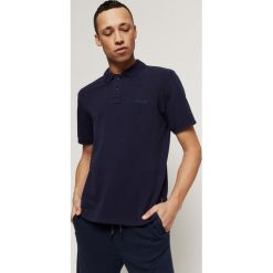 O'Neill Polo Koszulka Niebieski. Niebieskie podkoszulki męskie O'Neill, s, bez wzorów, z bawełny, bez rękawów. Za 180,95 zł.