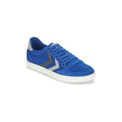 Buty Hummel SLIMMER STADIL DUO CANVAS LOW. Niebieskie trampki i tenisówki damskie Hummel, bez wzorów, bez zapięcia. Za 202,30 zł.