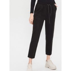 Spodnie typu jogger - Czarny. Czarne spodnie damskie House, xl, bez wzorów. W wyprzedaży za 69,99 zł.