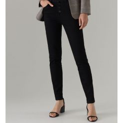 Jeansy skinny z wysokim stanem - Czarny. Czarne jeansy damskie Mohito, bez wzorów, z jeansu, z podwyższonym stanem. Za 109,99 zł.