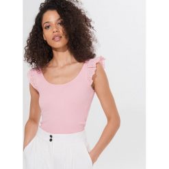 Top z bawełną organiczną Eco Aware - Różowy. Różowe topy damskie Mohito, s, bez wzorów, z bawełny, bez kołnierzyka. Za 39,99 zł.