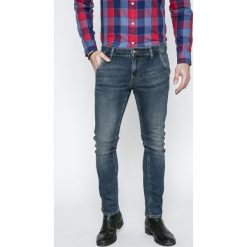 Guess Jeans - Jeansy Adam. Niebieskie jeansy męskie marki Guess Jeans. W wyprzedaży za 229,90 zł.
