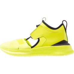 Fenty PUMA by Rihanna FENTY AVID Sneakersy niskie safety yellow. Żółte trampki i tenisówki damskie marki Fenty PUMA by Rihanna, bez wzorów, ze skóry ekologicznej, bez zapięcia. W wyprzedaży za 503,20 zł.