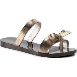 Japonki MELISSA - Love Lip Ad 32808 Black/Gold 50919. Żółte klapki damskie Melissa, bez wzorów, z tworzywa sztucznego, bez obcasa. Za 229,00 zł.